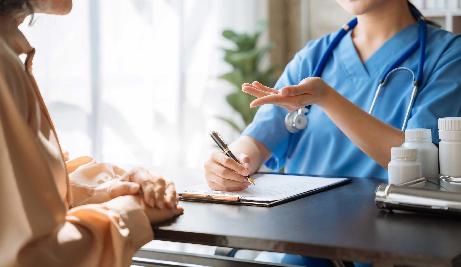 doctor talking to patient